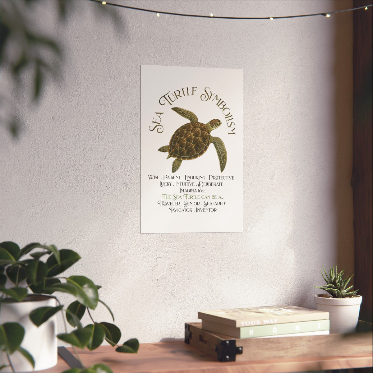 A vertical wall art print featuring a sea turtle illustration and the words 'Sea Turtle Symbolism' with descriptive text below, displayed on a wall above a wooden shelf with plants and books.