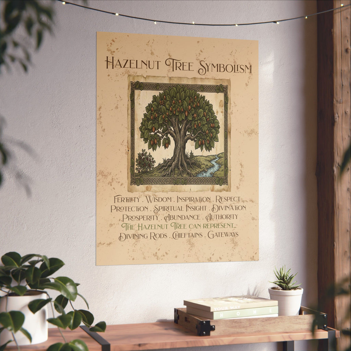A wall poster featuring a Hazelnut Tree illustration and the text 'Hazelnut Tree Symbolism,' displayed on a white wall above a wooden console with books and small plants.